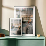 The 'Crossing Shibuya' photography print styled in a modern industrial loft, highlighting the contrast between the black-and-white street lines and the urban backdrop.