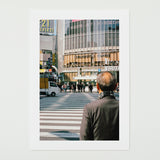 A detail shot of the Crossing Shibuya print on archival paper, showing the sharp architectural lines and the authentic grain of the 35mm film.