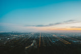 LA Observed by John Trif, a long exposure zoom-burst photography print of Los Angeles skyline from Griffith Observatory at sunset.