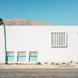 Minimalist photography of a white architectural wall and geometric shadows in Palm Springs. Fine art Studio Edition print by John Trif.